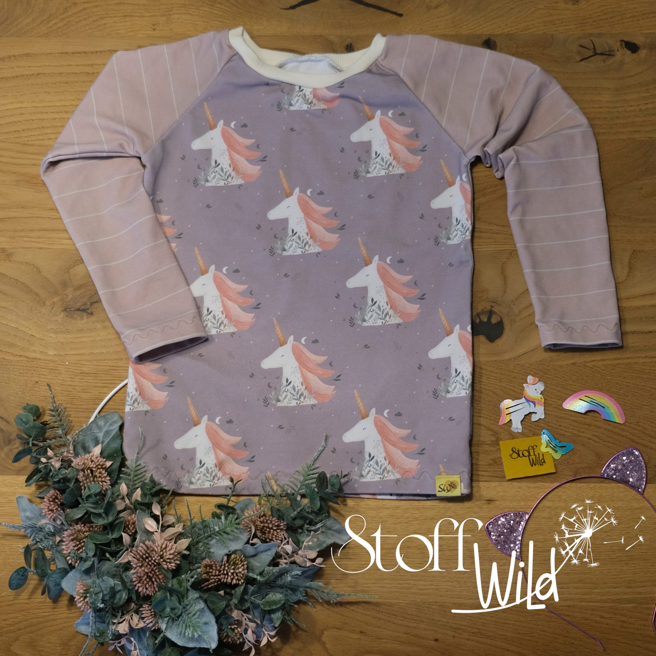 Mädchenpulli mit Raglanschnitt in Gr. 104