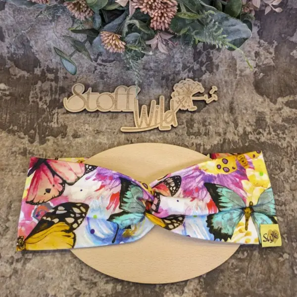Knoten Stirnband mit bunten Schmetterlingsmotiven aus weichem Jersey, Größen 46 bis 51 cm und 52 bis 58 cm, mit und ohne Knoten, handgefertigt in Österreich