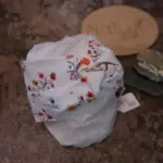 Stirnband mit Blumenwiesenmuster aus weichem Jersey, Größen 46 bis 51 cm und 52 bis 58 cm, mit und ohne Knoten, handgefertigt in Österreich