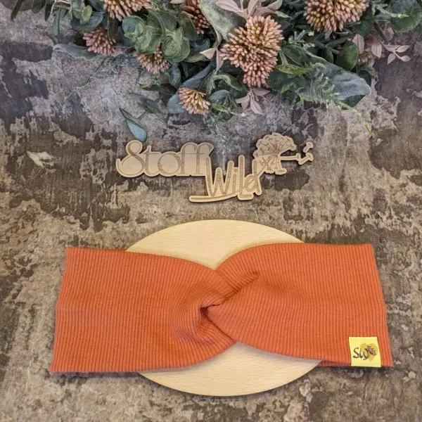 Knoten-Stirnband in Rost-Rot aus weichem Ripp-Jersey, Größen 46–51 cm und 52–58 cm, handgefertigt in Österreich