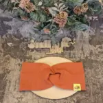 Knoten-Stirnband in Rost-Rot aus weichem Ripp-Jersey, Größen 46–51 cm und 52–58 cm, handgefertigt in Österreich