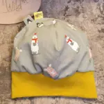 Bündchenhaube WinterTiere ocker, Gr. M – Bild 4