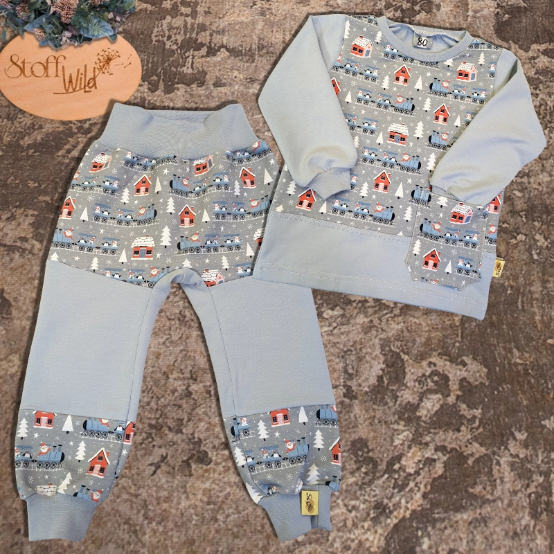 https://www.stoffwild.at/wp-content/uploads/baby-set-gr-80-winterzug-weihnachtsmann-pinguine-6.webp